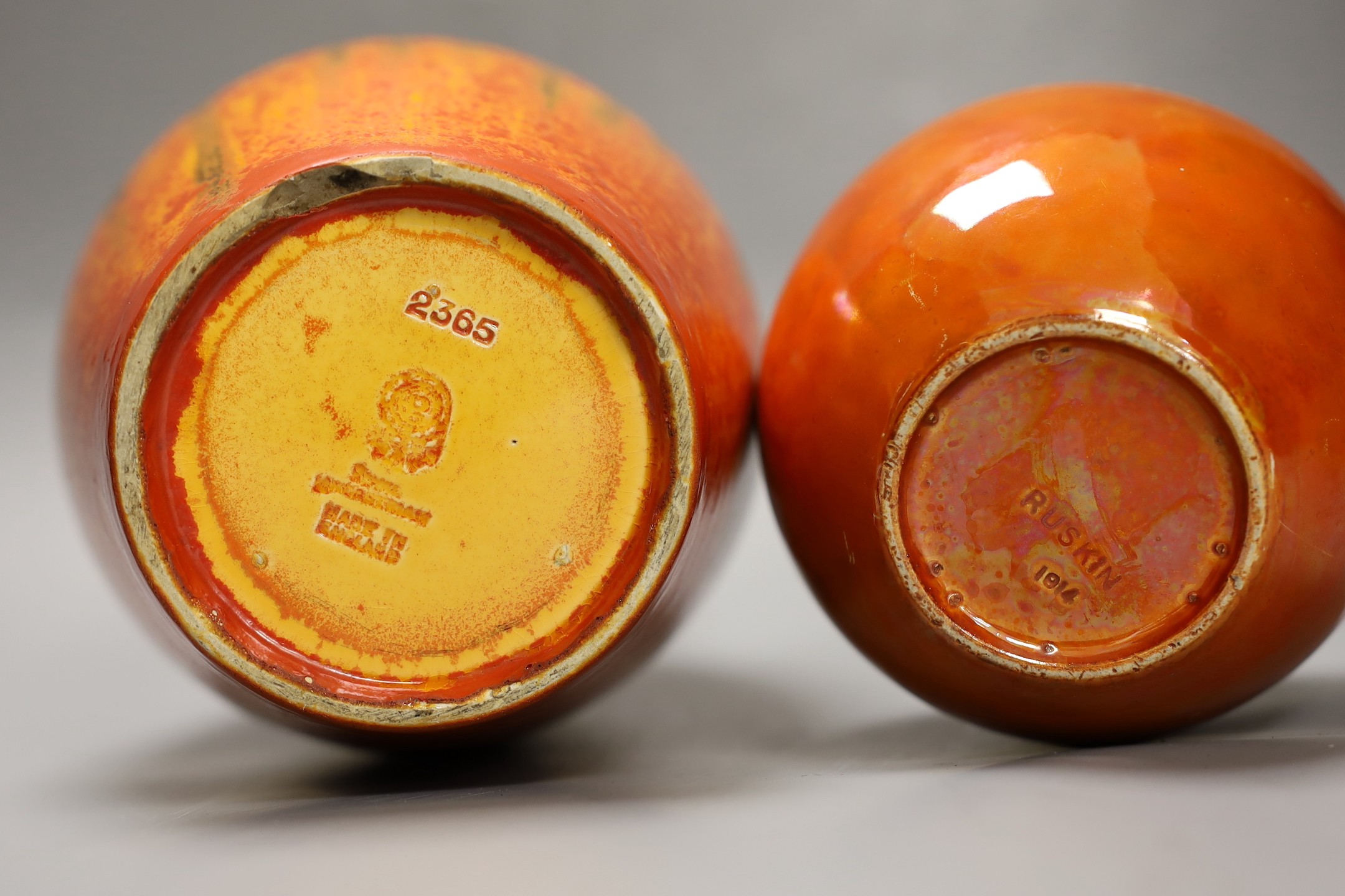 A Pilkington‘s Royal Lancastrian mottled orange ground vase and a Ruskin Orange lustre jar and cover, dated 1914, tallest 25cm